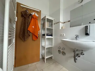 Ein Badezimmer in der Unterkunft Haus Alpina