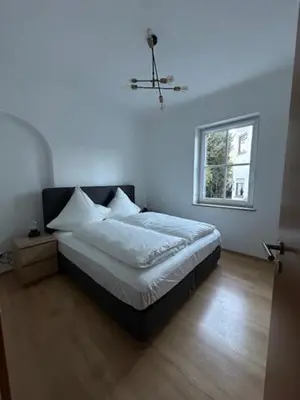 Ein Bett oder Betten in einem Zimmer der Unterkunft Haus Alpina