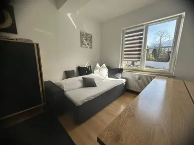 Ein Bett oder Betten in einem Zimmer der Unterkunft Haus Alpina