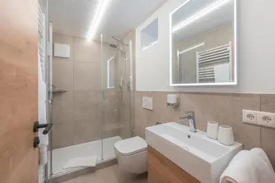 Ein Badezimmer in der Unterkunft Pension BergMoment Ferienwohnungen oder Zimmer mit Frühstück