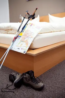 Ein Bett oder Betten in einem Zimmer der Unterkunft GS Hotel Mindelheim
