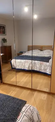 Ein Bett oder Betten in einem Zimmer der Unterkunft Sunny garden flat in Munich
