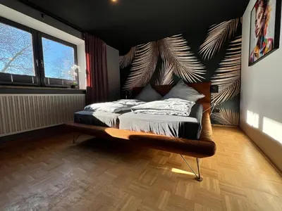 Ein Bett oder Betten in einem Zimmer der Unterkunft Stay Nice Thermen-Glück 3BR 100qm Whirlpool-Badewanne