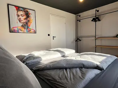 Ein Bett oder Betten in einem Zimmer der Unterkunft Stay Nice Thermen-Glück 3BR 100qm Whirlpool-Badewanne