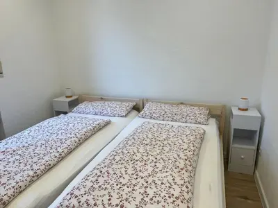 Ein Bett oder Betten in einem Zimmer der Unterkunft Kleine Wohlfühloase