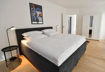 Ein Bett oder Betten in einem Zimmer der Unterkunft Ferienwohnung Welfenstein