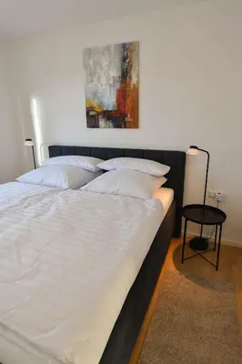 Ein Bett oder Betten in einem Zimmer der Unterkunft Ferienwohnung Welfenstein