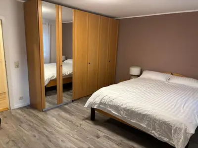 Ein Bett oder Betten in einem Zimmer der Unterkunft Gemütliche Wohnung in Wasserburg am Inn
