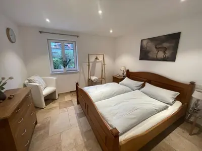 Ein Bett oder Betten in einem Zimmer der Unterkunft Ferienwohnung Rinser 4