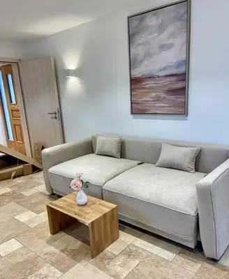 Ein Sitzbereich in der Unterkunft Ferienwohnung Rinser 4