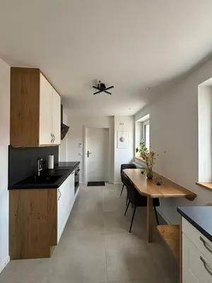 Küche/Küchenzeile in der Unterkunft Moderne 2-Schlafzimmer Wohnung für 2-3 Personen - Optimal für Arbeit und Erholung