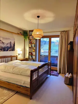 Ein Bett oder Betten in einem Zimmer der Unterkunft Ferienhaus an der Schlierach
