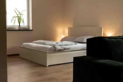 Ein Bett oder Betten in einem Zimmer der Unterkunft Ferienwohnung Siebenschläfer