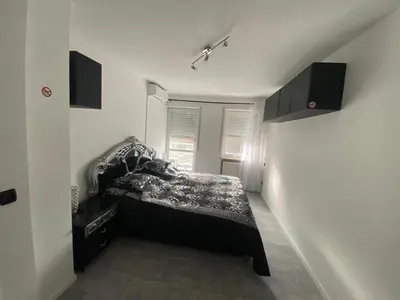 Ein Bett oder Betten in einem Zimmer der Unterkunft Attractive 2 room apartment south of Munich