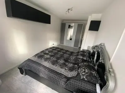 Ein Bett oder Betten in einem Zimmer der Unterkunft Attractive 2 room apartment south of Munich