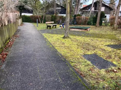 Ein Garten an der Unterkunft Attractive 2 room apartment south of Munich