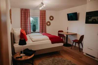 Ein Bett oder Betten in einem Zimmer der Unterkunft Eichel Apartments
