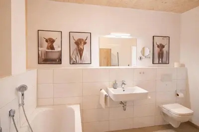 Ein Badezimmer in der Unterkunft ChiemseeRefugium - Ferienwohnung Berg