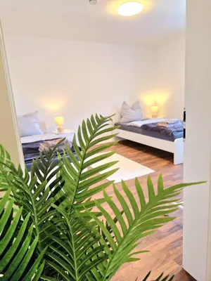 Ein Bett oder Betten in einem Zimmer der Unterkunft Apartment Isar