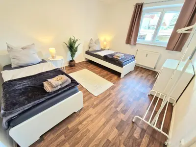 Ein Bett oder Betten in einem Zimmer der Unterkunft Apartment Isar