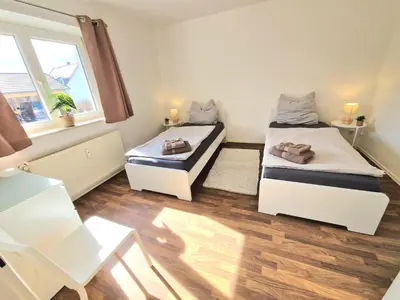 Ein Bett oder Betten in einem Zimmer der Unterkunft Apartment Isar