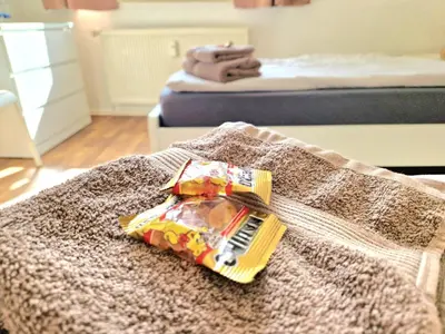 Ein Bett oder Betten in einem Zimmer der Unterkunft Apartment Isar