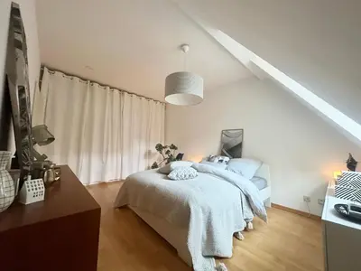 Ein Bett oder Betten in einem Zimmer der Unterkunft Charmantes Stadthaus im Herzen von München