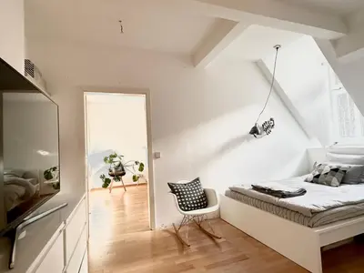 Ein Bett oder Betten in einem Zimmer der Unterkunft Charmantes Stadthaus im Herzen von München