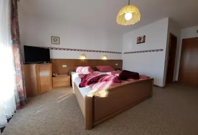 Ein Bett oder Betten in einem Zimmer der Unterkunft Pension Schwaiger