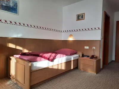 Ein Bett oder Betten in einem Zimmer der Unterkunft Pension Schwaiger