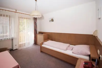 Ein Bett oder Betten in einem Zimmer der Unterkunft Pension Schwaiger