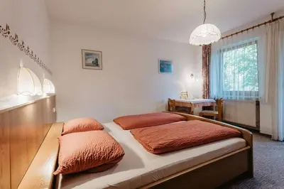Ein Bett oder Betten in einem Zimmer der Unterkunft Pension Schwaiger