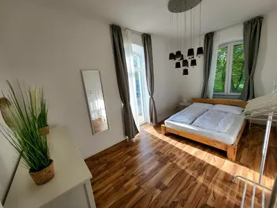 Ein Bett oder Betten in einem Zimmer der Unterkunft Suite 3 - Apartments am Schloss