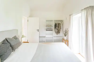 Ein Bett oder Betten in einem Zimmer der Unterkunft Zuhaus Freiweidach - Design Holiday Home Chiemgau