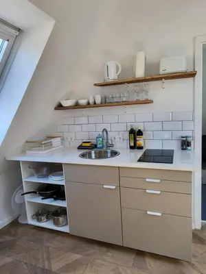 Küche/Küchenzeile in der Unterkunft Dachgeschosswohnung 2 - Apartments am Schloss