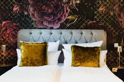 Ein Bett oder Betten in einem Zimmer der Unterkunft Marie - serviced Apartments an der Messe München