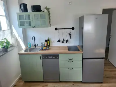 Küche/Küchenzeile in der Unterkunft 2-Zimmer Wohnung 1 - Apartments am Schloss