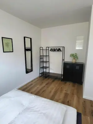 Ein Bett oder Betten in einem Zimmer der Unterkunft 2-Zimmer Wohnung 1 - Apartments am Schloss
