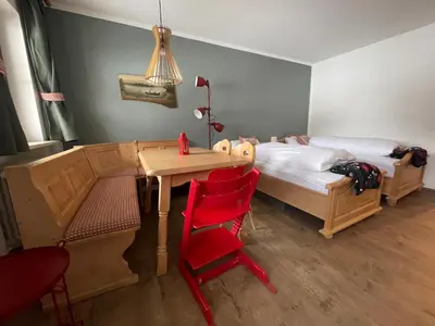 Ein Bett oder Betten in einem Zimmer der Unterkunft Ferienwohnung Berglodge Chiemsee