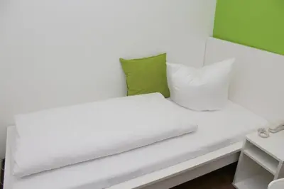 Ein Bett oder Betten in einem Zimmer der Unterkunft Hostel S16