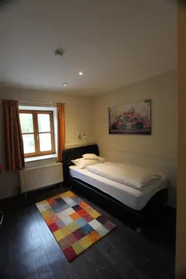 Ein Bett oder Betten in einem Zimmer der Unterkunft Hotel Gasthof zum Anker