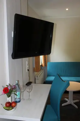 Ein Sitzbereich in der Unterkunft Hotel Gasthof zum Anker