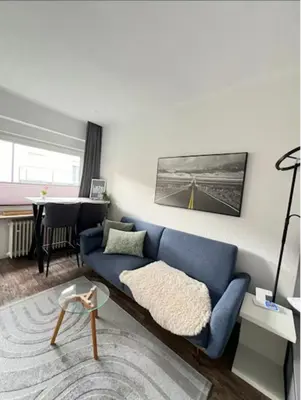 Ein Sitzbereich in der Unterkunft Old Town Apartment,mit renovierten Bad