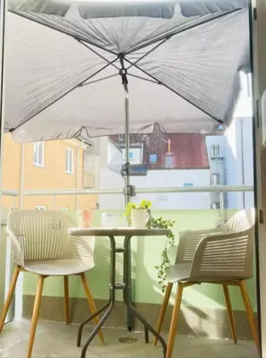Ein Patio oder anderer Außenbereich in der Unterkunft Old Town Apartment,mit renovierten Bad