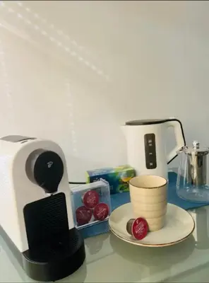 Kaffee-/Teezubehör in der Unterkunft Old Town Apartment,mit renovierten Bad
