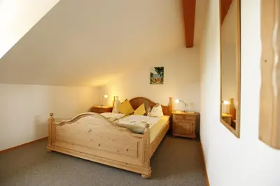 Ein Bett oder Betten in einem Zimmer der Unterkunft Wagnerhof