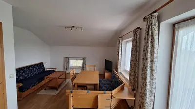 Ein Sitzbereich in der Unterkunft Prassberger Urlaub auf dem Bauernhof