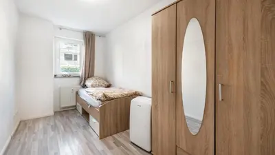 Ein Bett oder Betten in einem Zimmer der Unterkunft Ruhig