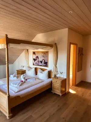 Ein Bett oder Betten in einem Zimmer der Unterkunft Gasthof Janser