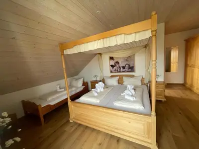 Ein Bett oder Betten in einem Zimmer der Unterkunft Gasthof Janser
